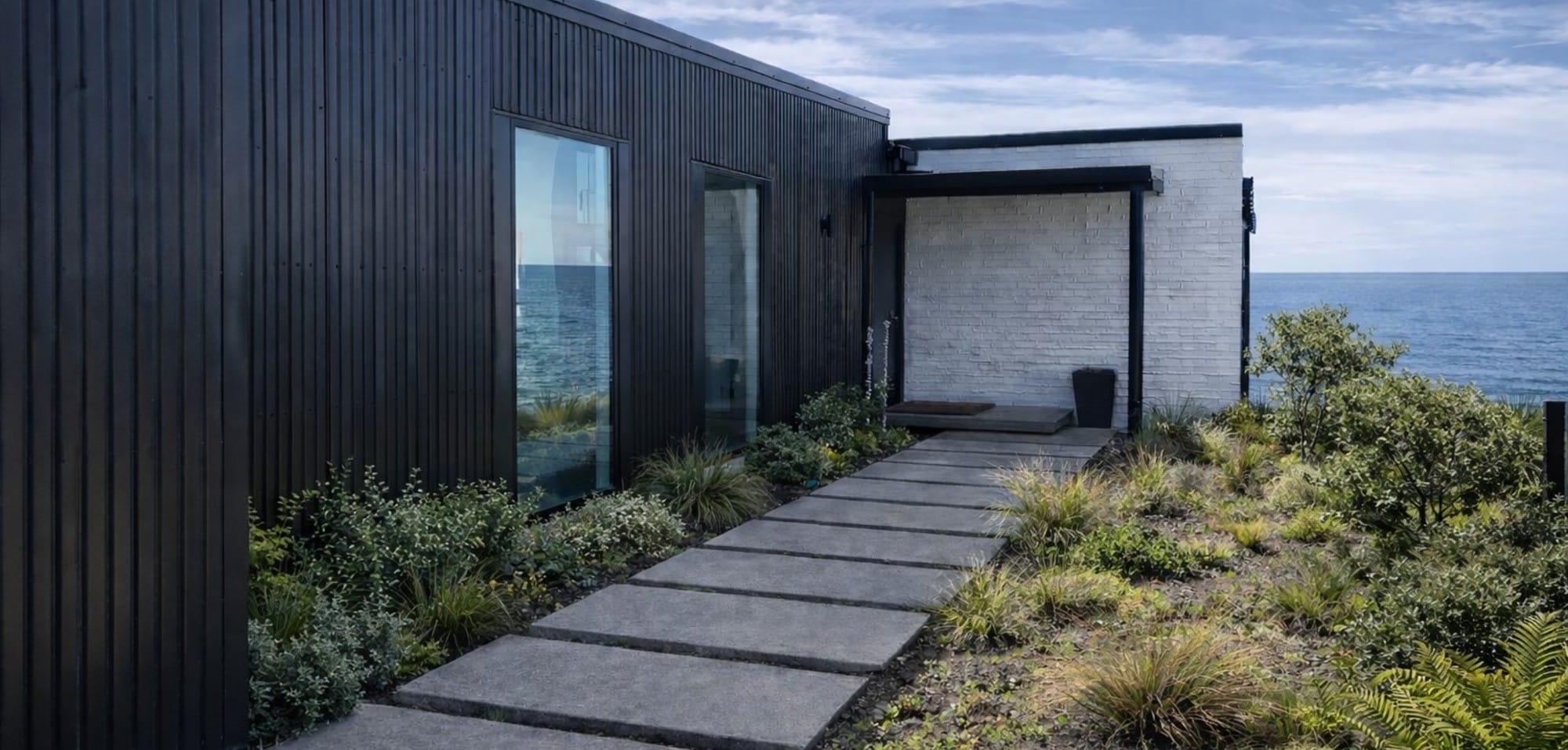 Ferguson Street coastal home designed and built by SS Homes Hawke’s Bay with skillion ceilings and modern black cladding